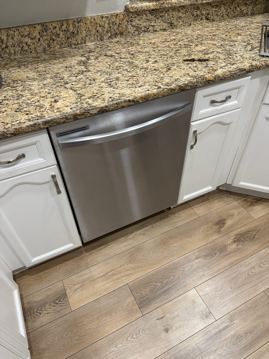 Stainless steel dishwasher serviced by Express Xpert in Broward