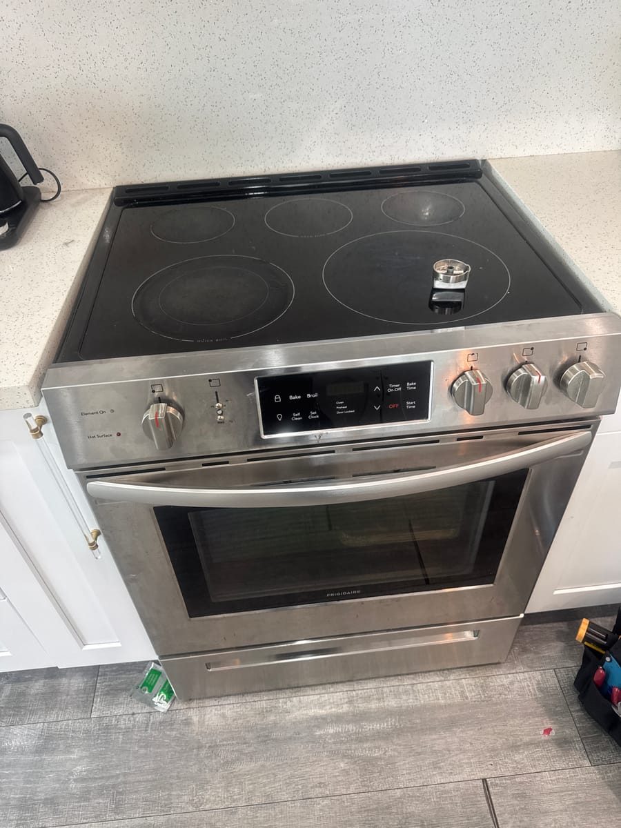 Frigidaire electric range serviced by Express Xpert in a Broward County kitchen