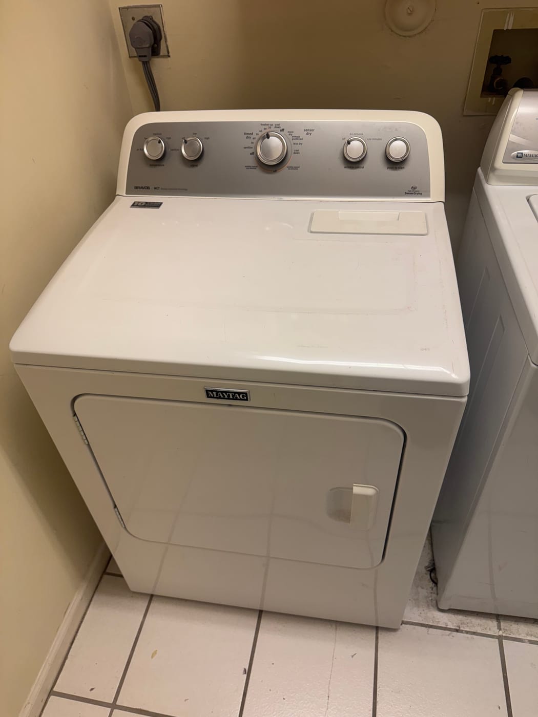 Maytag dryer repaired by Express Xpert in a Palm Beach County laundry room